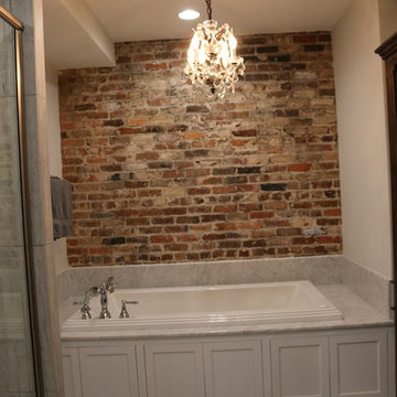 Loft Bathroom Tub with original brick wall