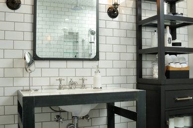 Urban white tile and subway tile bathroom photo in Edmonton with a console sink