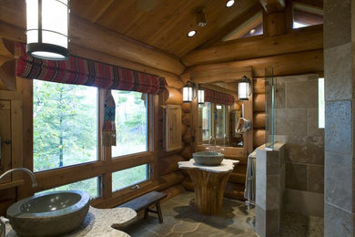 Inspiration for a rustic bathroom remodel in Minneapolis with a vessel sink