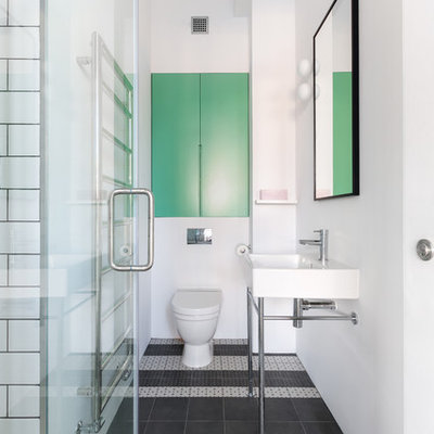 Inspiration for a scandinavian ceramic tile mosaic tile floor and multicolored floor bathroom remodel in London with a console sink, white walls and a one-piece toilet