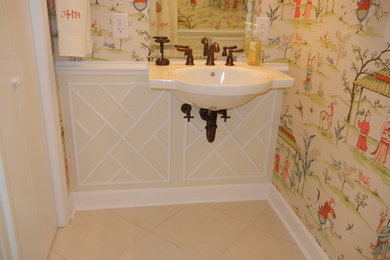 Example of a mid-sized asian master ceramic tile alcove shower design in Other with recessed-panel cabinets, white cabinets, a one-piece toilet and multicolored walls