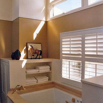 Louvers add bath tub privacy.