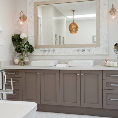 Freestanding bathtub - transitional freestanding bathtub idea in Vancouver with white countertops