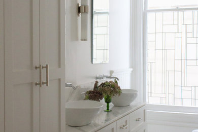 Photo of a medium sized victorian ensuite bathroom in San Francisco with shaker cabinets, white cabinets, a claw-foot bath, white walls, ceramic flooring, a vessel sink, quartz worktops, white floors and grey worktops.