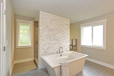 Inspiration for a large contemporary master beige tile, gray tile and stone tile porcelain tile and beige floor bathroom remodel in Atlanta with beige walls