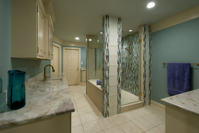 Example of a large transitional master matchstick tile bathroom design in DC Metro with beige cabinets and green walls