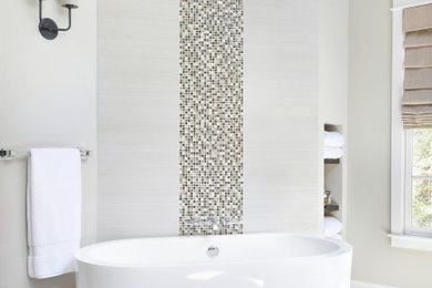 Inspiration for a large classic ensuite bathroom in Atlanta with a freestanding bath, beige walls and beige floors.