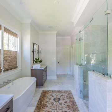 Luxurious Master Bath with Marble Floors, Counters and Shower