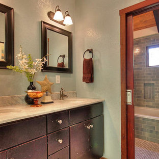 Inspiration for a mid-sized craftsman 3/4 corner bathtub remodel in San Francisco with flat-panel cabinets, brown cabinets, multicolored walls, an undermount sink and granite countertops