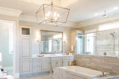 Example of a huge transitional master gray tile and marble tile porcelain tile and gray floor bathroom design in Birmingham with gray cabinets, beige walls, an undermount sink, marble countertops and white countertops