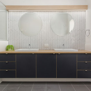 Design ideas for a contemporary master bathroom in Perth with flat-panel cabinets, a curbless shower, white walls, a drop-in sink and grey floor.
