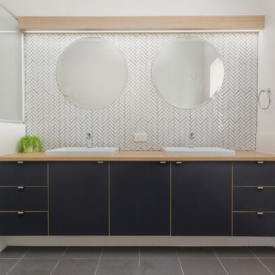 Trendy master gray floor walk-in shower photo in Perth with flat-panel cabinets, white walls and a drop-in sink
