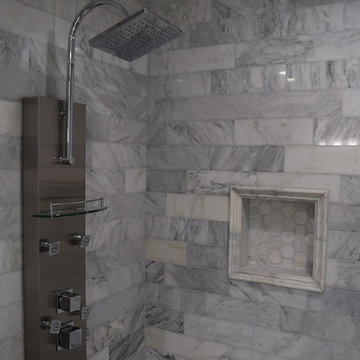 Magnificent Master Tile Bathroom with Frameless Shower Door
