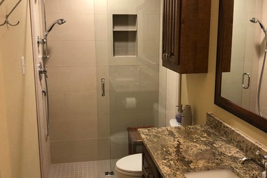 Major bathroom remodel with bath to shower conversion