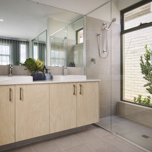 Design ideas for a contemporary bathroom in Perth with flat-panel cabinets, light wood cabinets, an alcove shower, gray tile, a vessel sink, grey floor, white benchtops, a double vanity and a built-in vanity.