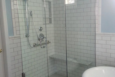 Mid-sized elegant master white tile and subway tile medium tone wood floor and blue floor bathroom photo in Other with beaded inset cabinets, white cabinets, blue walls, an undermount sink, marble countertops and a hinged shower door