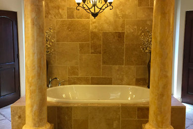 Corner bathtub - large mediterranean master beige tile and stone tile travertine floor and beige floor corner bathtub idea in Albuquerque with beige walls