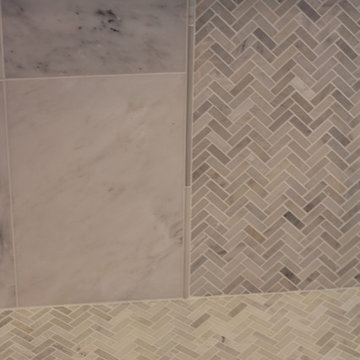 Marble Herringbone Tile Floor meets Herringbone Accent Tile