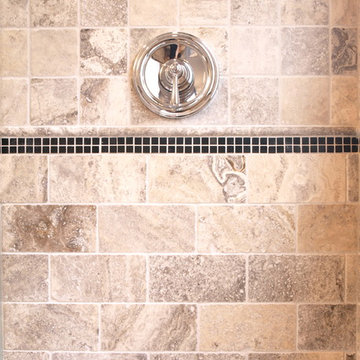 Marble Tiled Shower with Chrome Shower Fixtures