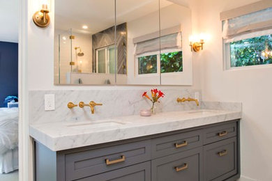 Mid-sized transitional master gray tile and marble tile marble floor and white floor bathroom photo in San Francisco with recessed-panel cabinets, gray cabinets, marble countertops, a hinged shower door and gray countertops