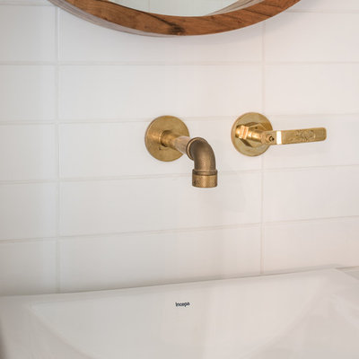 Example of a mid-sized trendy 3/4 white tile and subway tile bathroom design in Dallas with white walls and a vessel sink