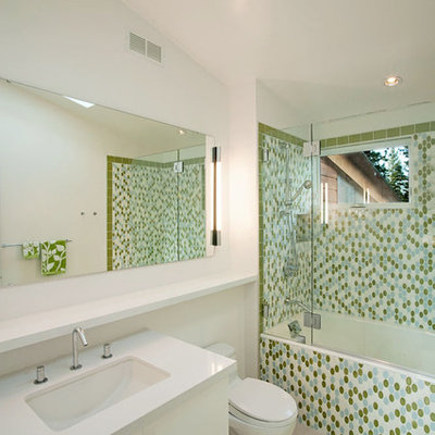 Example of a trendy mosaic tile tub/shower combo design in Sacramento with an undermount sink