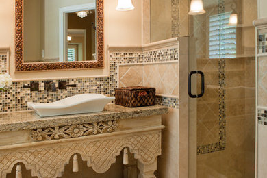 Bathroom - traditional bathroom idea in Denver with granite countertops and a vessel sink