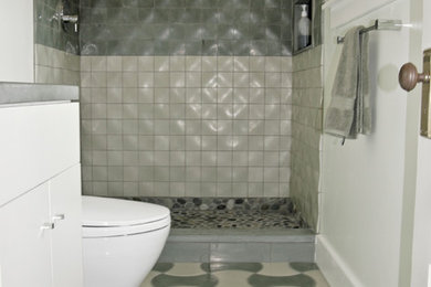 Example of a small trendy 3/4 multicolored tile and cement tile concrete floor doorless shower design in Portland with an undermount sink, flat-panel cabinets, white cabinets, concrete countertops and a two-piece toilet