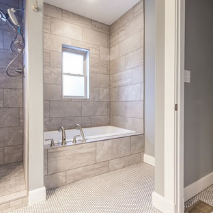 Bathroom - mid-sized craftsman 3/4 gray tile and porcelain tile ceramic tile and white floor bathroom idea in Albuquerque with shaker cabinets, medium tone wood cabinets, a two-piece toilet, gray walls, a drop-in sink, laminate countertops and white countertops