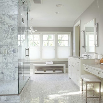 Corner shower - large traditional mosaic tile and white tile mosaic tile floor corner shower idea in Minneapolis with an undermount sink, recessed-panel cabinets, white cabinets, marble countertops, gray walls and white countertops