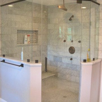 Master bath corner shower, marble subway tile, oil rubbed bronze fixtures