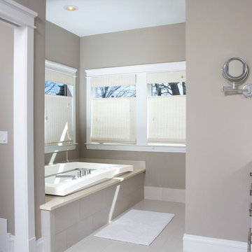 Master Bath Features Max Urban Tub, Porcelain Tile Floors and Cambria Countertop