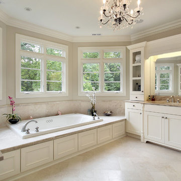 Master bath in luxury home with large tub