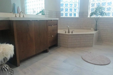 Inspiration for a large traditional ensuite bathroom in Miami with flat-panel cabinets, medium wood cabinets, a submerged sink, engineered stone worktops, an open shower and white worktops.