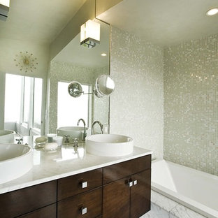 Bathroom - contemporary mosaic tile marble floor bathroom idea in San Francisco with marble countertops and a vessel sink