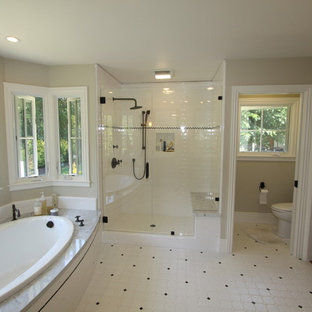 Inspiration for a huge timeless master white tile and porcelain tile ceramic tile bathroom remodel in San Francisco with marble countertops and yellow walls