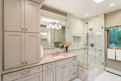 Example of a classic bathroom design in Denver with granite countertops