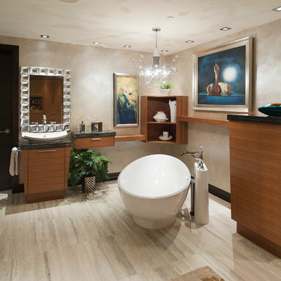 Freestanding bathtub - contemporary freestanding bathtub idea in Vancouver with a vessel sink