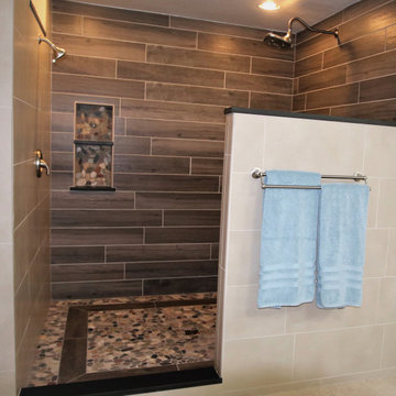 Master Bath Remodel with Wood Tile Planking and Pebble Mosaic Flooring