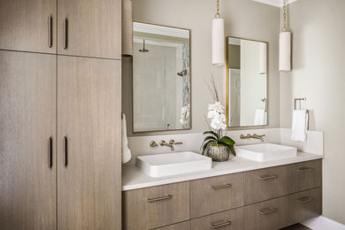 Bathroom - mid-sized transitional master porcelain tile porcelain tile and double-sink bathroom idea in Charlotte with flat-panel cabinets, light wood cabinets, a vessel sink, quartz countertops and a floating vanity