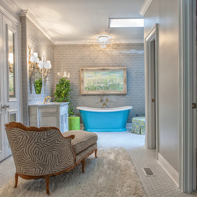 Mid-sized elegant master subway tile and gray tile porcelain tile bathroom photo in Atlanta with shaker cabinets, distressed cabinets, gray walls, an undermount sink and marble countertops