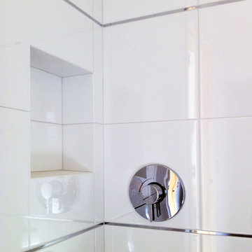 master bath | shower white tile and chrome finishes
