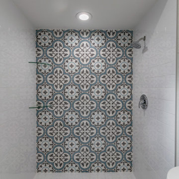 Master bath with cement tile feature wall