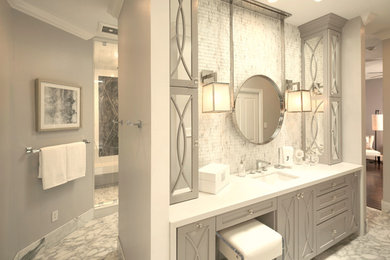 Inspiration for a mid-sized contemporary master matchstick tile and white tile marble floor and white floor bathroom remodel in Houston with furniture-like cabinets, gray cabinets, an undermount sink, quartz countertops, a hinged shower door, a one-piece toilet and gray walls