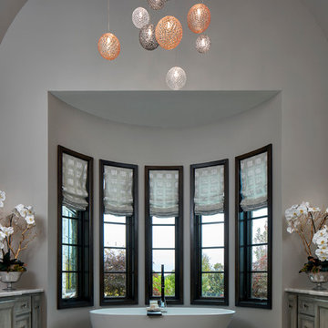 Master Bath With Freestanding Tub and Glass Cluster Chandelier