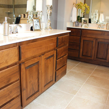 Master Bath with knotty alder cabinets and white counter tops