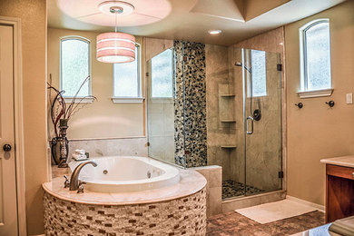Inspiration for a large transitional master beige tile and porcelain tile ceramic tile bathroom remodel in Houston with medium tone wood cabinets, beige walls, a drop-in sink and a hinged shower door