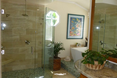 Example of a mid-sized transitional master beige tile and porcelain tile travertine floor bathroom design in San Diego with raised-panel cabinets, beige walls and granite countertops
