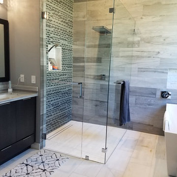Master Bathroom Full Remodel Featuring Marble Floors and Countertops