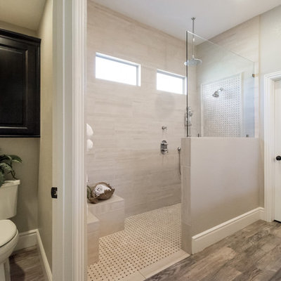 Inspiration for a mid-sized timeless master beige tile and porcelain tile porcelain tile and gray floor bathroom remodel in Phoenix with black cabinets, a one-piece toilet, gray walls, a drop-in sink and quartzite countertops